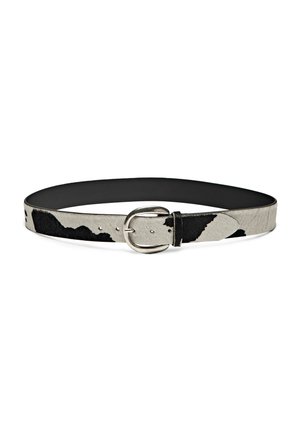 Leather belt with black and white cowhide pattern, silver oval buckle, and multiple adjustment holes, displayed flat on white background.