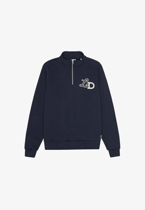 Sweatshirt azul marinho com gola alta e meio fecho. Apresenta um logótipo branco "LD" no peito e punhos e bainha canelados. Feito em mistura de algodão.