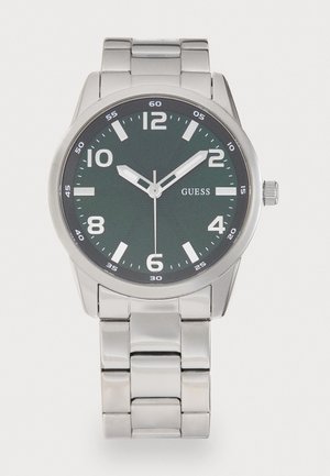 Silberner Edelstahluhren mit Zifferblatt in dunklem Grün, weißen Stundenmarkierungen und Datumsanzeige. Verfügt über ein poliertes Armband und ein rundes Gehäusedesign.