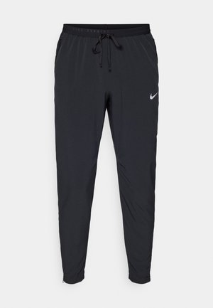 Nike Performance DF STRIDE WVN  - Spodnji deli trenirk - black/reflective silver