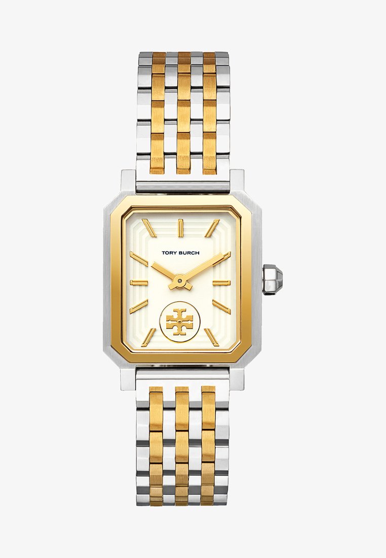 Taisnstūra formas Tory Burch pulksteņi ar zeltītu un sudrabotu metāla siksniņu, krēma krāsas ciparnīcu, zelta stundu marķieriem, logo centrā un astoņstūra formas zeltīta rāmīša.