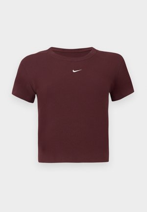 Burgundi színű pamut keverék póló rövid ujjakkal, bordázott textúrával, és fehér Nike logóval a mellkasán. Egyszerű kerek nyakkivágás, cropped fazon.