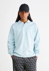 Puma Poloshirt - turquoise surf