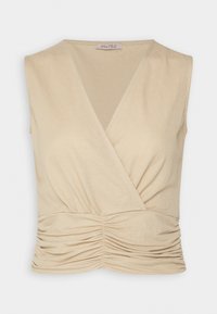Haut beige sans manches à effet cache-cœur avec col en V et détail froncé à la taille, conçu par Anna Field.