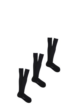 Calzini neri fino al ginocchio con una texture a coste e una soletta liscia. Ogni calzino presenta un logo del marchio discreto sulla suola.