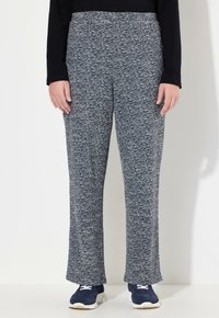Marineblauwe en grijze gebreide broek met een licht gestructureerde stof, voorzien van een elastische tailleband en een rechte pijpdesign.