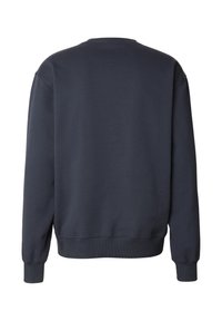 Sweat-shirt bleu marine à col rond, avec manches longues, poignets côtelés et tissu doux et texturé. Dos uni.