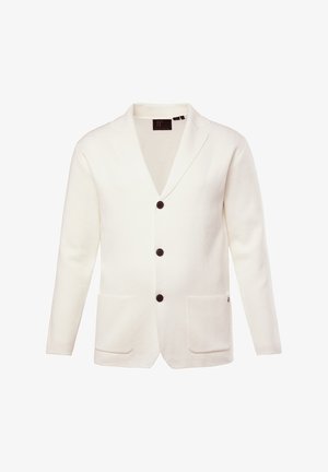 Blazer blanc en tissu texturé, doté d'un col à revers, de quatre boutons marron et de deux poches avant.