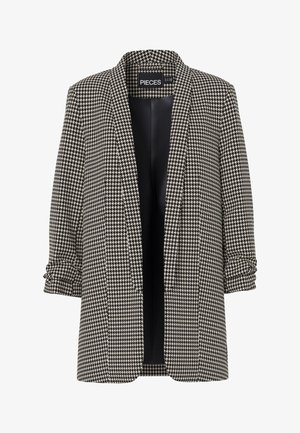 Mustriga mustvalge houndstooth ülikondjakk. Kohandatud disain, millel on mugav lõige, avatud esiosa ja üles keeratud varrukad. Sile sisevooder.