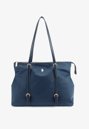 Marineblaue Tote-Tasche mit doppelten Schulterriemen, goldenen Schnallen, Reißverschluss und kleinem goldenen Emblem mittig vorne.
