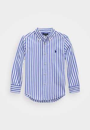 Niebiesko-biała koszula w paski z długim rękawem i kołnierzykiem na guziki, z małym logo, zaokrąglonym dołem i zapinana na guziki. Materiał bawełniany.