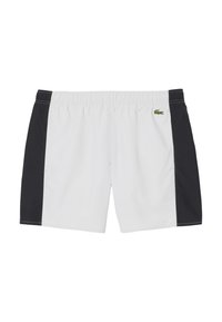 Witte zwemshorts met zwarte zijkanten, elastische tailleband en Lacoste krokodil logo aan de linkervoordel. Soepele, lichtgewicht stof.