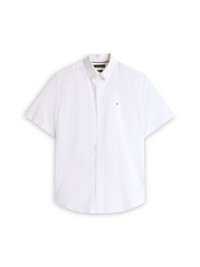 Camicia bianca a maniche corte con bottoni e colletto, con piccolo logo Tommy Hilfiger sul lato sinistro del petto.