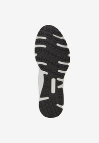Schuhsohle aus strukturiertem schwarzem Gummi, mit rechteckigen und Zickzack-Mustern für besseren Halt. Weiße Zwischensohle mit Markendetails.