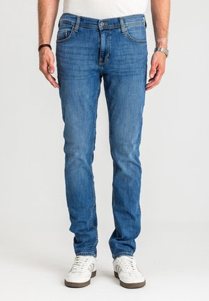 - Jeansy Slim Fit