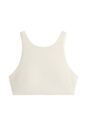 Kermanvalkoinen teksturoitu neulottu hihaton crop top leveillä hartiahihnoilla ja pyöreällä pääntiellä.