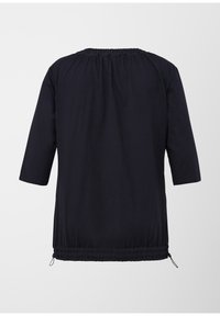 Tunic nera con maniche a tre quarti, scollatura arricciata e orlo regolabile con cordoncino. Tessuto morbido con una texture liscia.