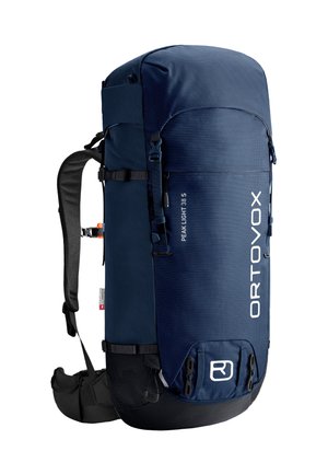 Dunkelblauer Rucksack mit runder Oberseite, aus strukturiertem Material gefertigt. Verfügt über verstellbare Riemen, seitliche Schnallen und gemusterte Akzente.