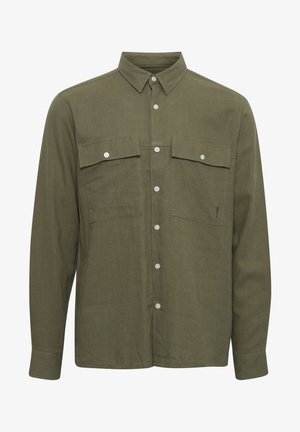 Olíval zöld, hosszú ujjú gombos ing, texturált anyagból készült, két mellzsebbel és fehér gomb díszítéssel.