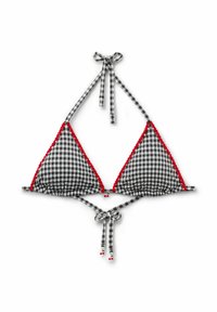Haut de bikini en vichy noir et blanc avec un bord en pompons rouges, des bonnets triangulaires, des liens ajustables et des accents métalliques à l'arrière.