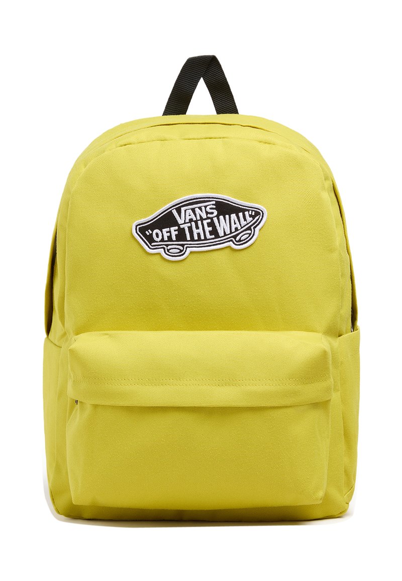 Mochila de tela amarilla con un bolsillo frontal, parche con el logo negro "VANS OFF THE WALL" y un asa en la parte superior tipo cinta. Diseño rectangular simple.