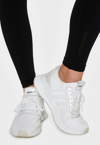 SQUATPROOF PURPOUSE - Leggings - black