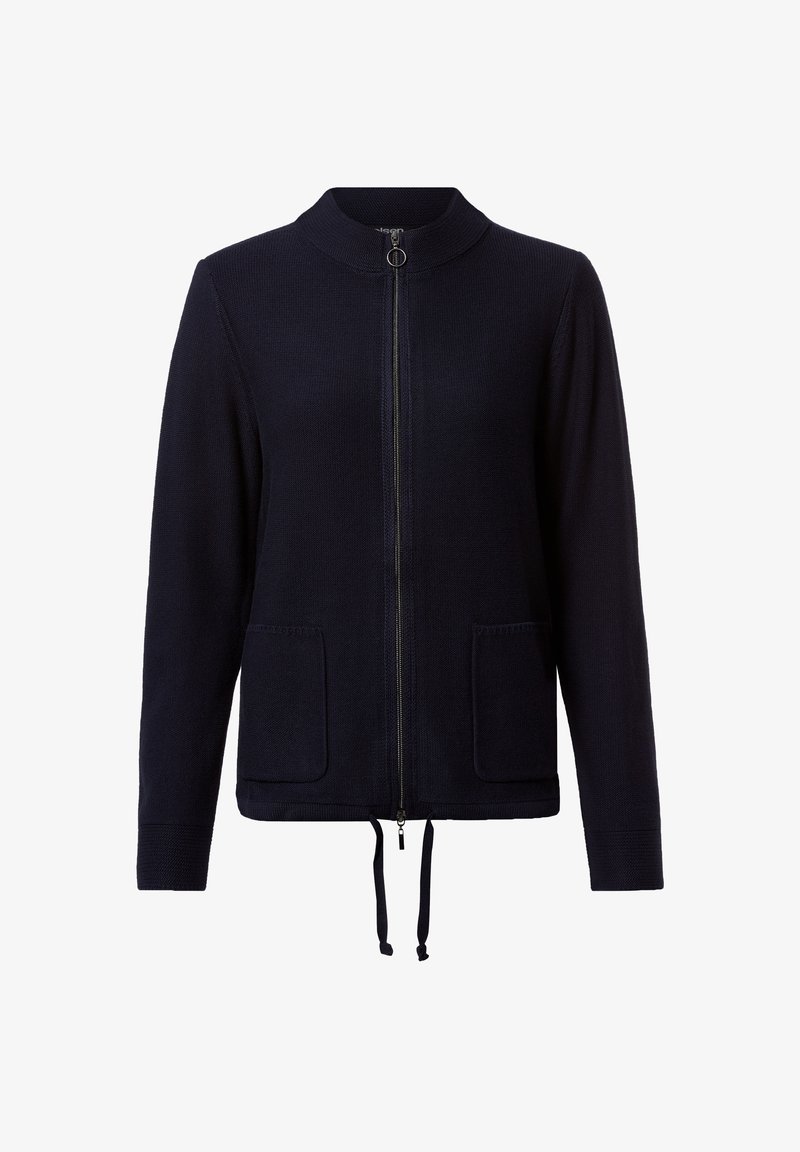 Veste zippée bleu marine en tissu texturé avec un col haut, deux poches avant et un cordon de serrage réglable à l'ourlet.