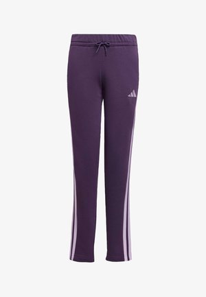 Pantaloni della tuta viola realizzati in un mix di cotone, con una vestibilità comoda, cintura elastica con cordino e righe laterali bianche. Logo Adidas presente.