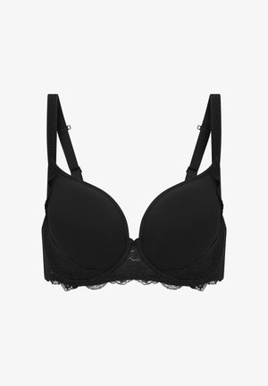 Sort formet bh med blonder, justerbare stropper, glatte skåle og en subtil bølget kant langs båndet. Klassisk design og materialer.