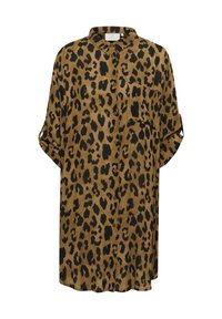 Robe chemise à imprimé léopard brun et noir avec un col, des boutons sur le devant et une poche. Elle présente des manches roulées et une coupe ample.
