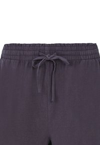 Pantalon avec une ceinture élastique gris foncé avec un cordon en tissu noué au centre devant.
