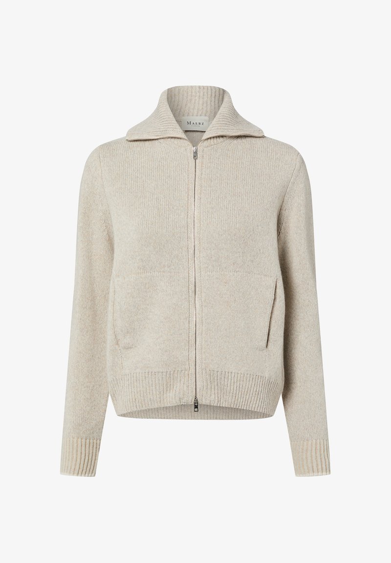 Beige knit cardigan with a ribbed collar, full zip, and two front pockets. Features ribbed cuffs and hem for a textured finish.
