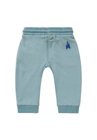 Lichtblauwe sweatpants van zacht katoen. Voorzien van een geribbelde elastische tailleband en boorden, met een afgedrukt kasteellogo op de dij.