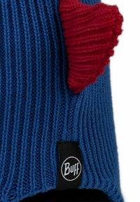 Blue knitted hat featuring a red knitted heart accent, ribbed texture, and a black Buff brand label on the side.