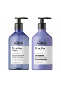 Two 500 ml bottles of L'Oréal Professionnel Blondifier hair products. One is a purple shampoo with a pump; the other a matching conditioner.