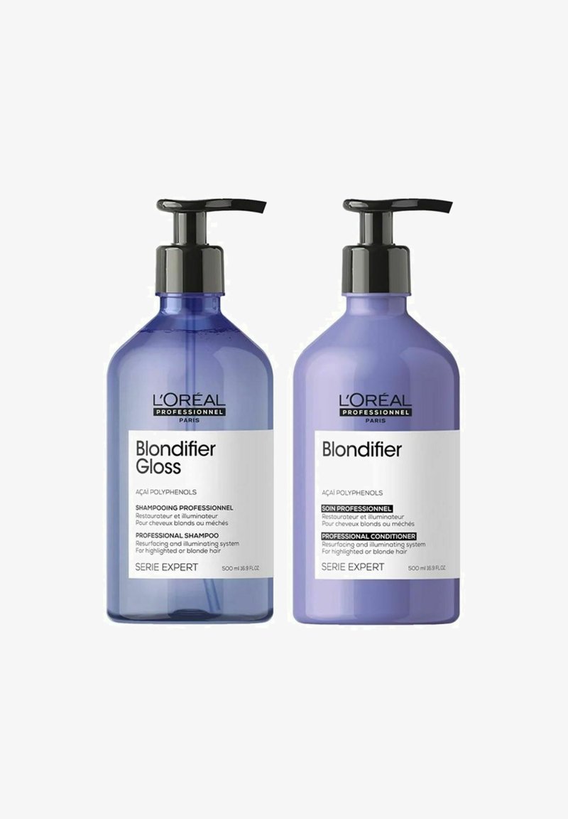 Two 500 ml bottles of L'Oréal Professionnel Blondifier hair products. One is a purple shampoo with a pump; the other a matching conditioner.