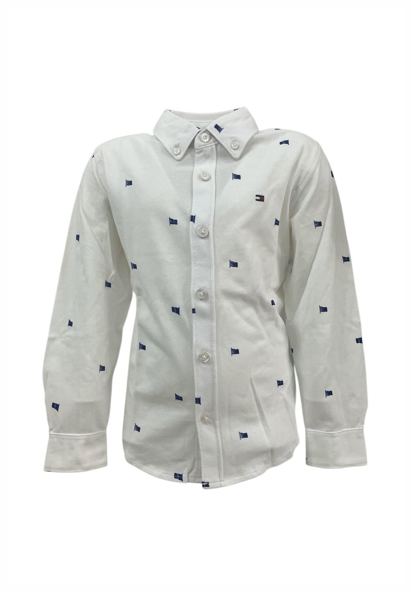 Camicia bianca a maniche lunghe con piccoli motivi a bandiera blu, chiusura frontale con bottoni e colletto a punta. Realizzata in tessuto di cotone con una texture liscia.