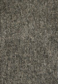 Woven carpet with a patterned texture featuring alternating dark gray and light beige stripes. Dense fibers create a soft surface.