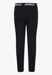 Leggings de sport noirs avec une texture lisse, une taille élastique contrastante arborant une marque blanche, et des panneaux en mesh sur les côtés.
