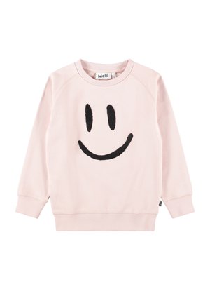Lichtroze sweater met lange mouwen, zwart smiley gezicht ontwerp en geribde boorden, kraag en zoom, met het label "Molo" aan de binnenkant van de hals.