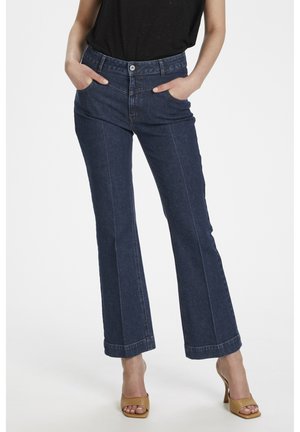 Flared Jeans - dark rinse denim