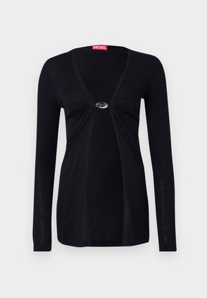 Must tume narmasteega, millel on sügav V-kaelus, keskel kogutud kangas ja hõbedane aksessuaar rinnakorvil. Pehme kangastekstu.