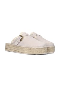 Lichtbeige suède muiltjes met geweven jute zolen, voorzien van een decoratieve geborduurde rand en een verstelbare gesp aan elke kant.
