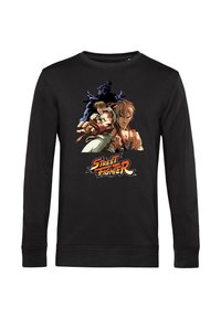 Felpa nera a maniche lunghe con una grafica vivace sul davanti raffigurante personaggi di Street Fighter e un logo in giallo e rosso in grassetto.