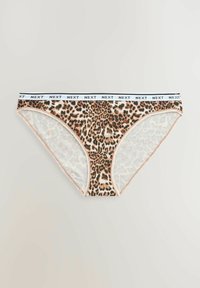 Underkläder i leopardmönster med ett mjukt tyg, och en vit elastisk midjeband med texten "NEXT". Designen har genomskinliga sidor.