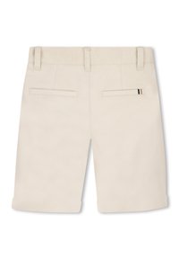 Μπεζ σορτς με απαλή υφή, ζωνάρι στη μέση, δύο πίσω τσέπες και ρεβέρ στο τελείωμα. Διακριτική διακόσμηση με block χρώματος στο εσωτερικό της τσέπης.