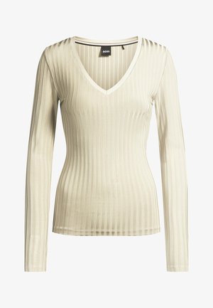 Beige long-sleeve top with a ribbed texture, V-neck design, and fitted shape. Features a tag with the brand name "BOSS" on the inside.