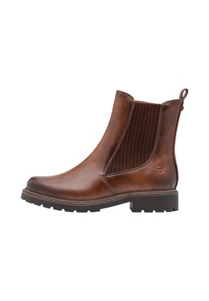 Stivaletto in pelle marrone con pannello laterale elastico testurizzato, linguetta sul retro, punta rotonda, suola cucita e tacco basso a blocco.