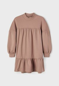 Langærmet A-linie kjole i blød beige stof. Har en ripet mock neck og lagdelt flæse i kanten. Lidt puffede ærmer med ribbede manchetter.