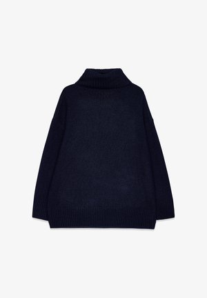 Pull à col roulé bleu marine foncé avec un tricot texturé, doté d'une coupe décontractée et de manches et d'ourlets côtelés. La vue de dos montre le style du col.
